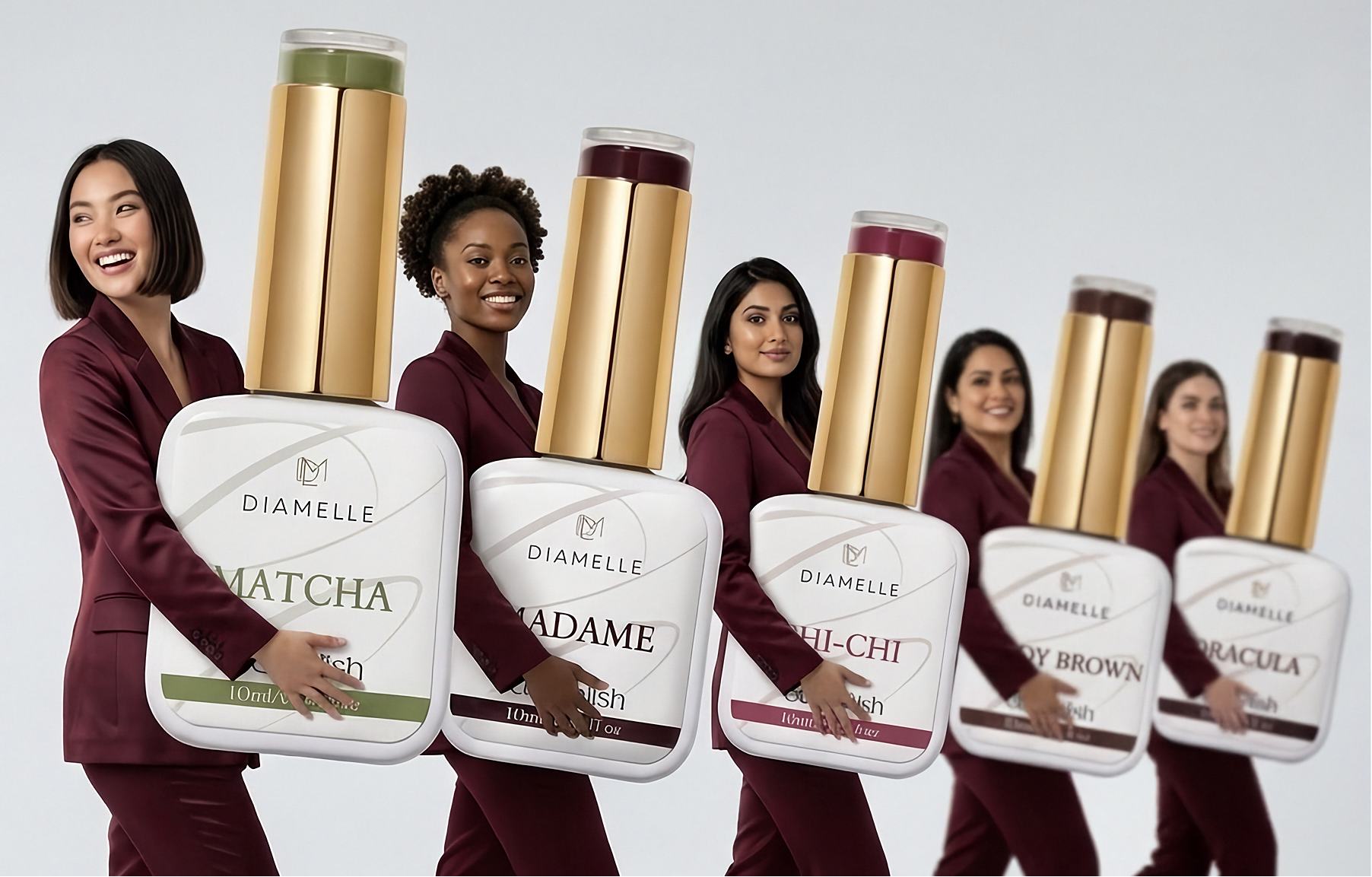 Group of women holding Diamelle nail polish bottles against a white background